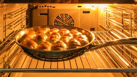 Pies with jam in the oven royalty free stock image Pies with jam in the oven royalty free stock image